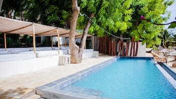 Outdoor pool, an infinity pool, sun loungers