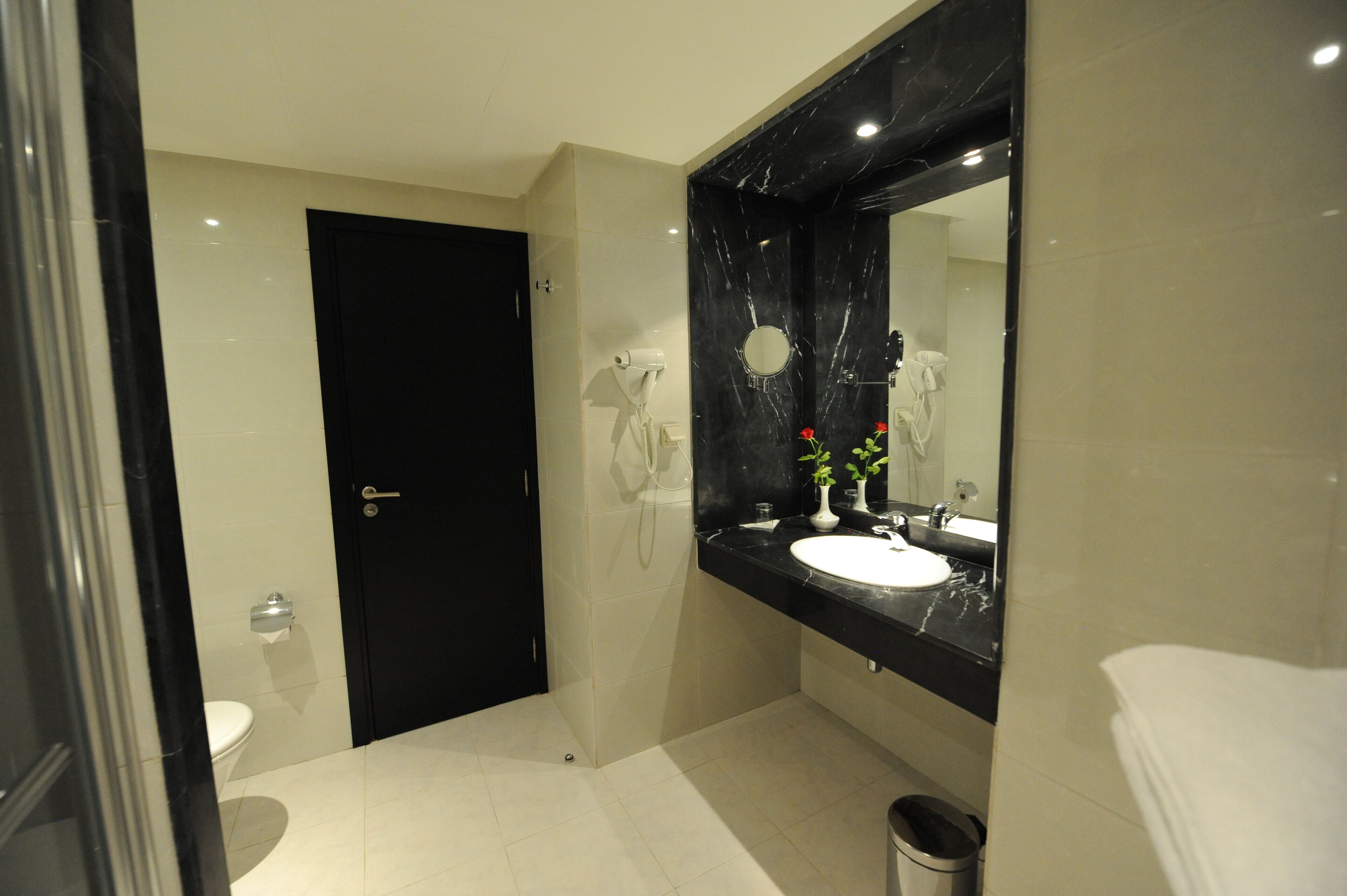 deep-soaking bathtub, rainfall showerhead, free toiletries, hair dryer