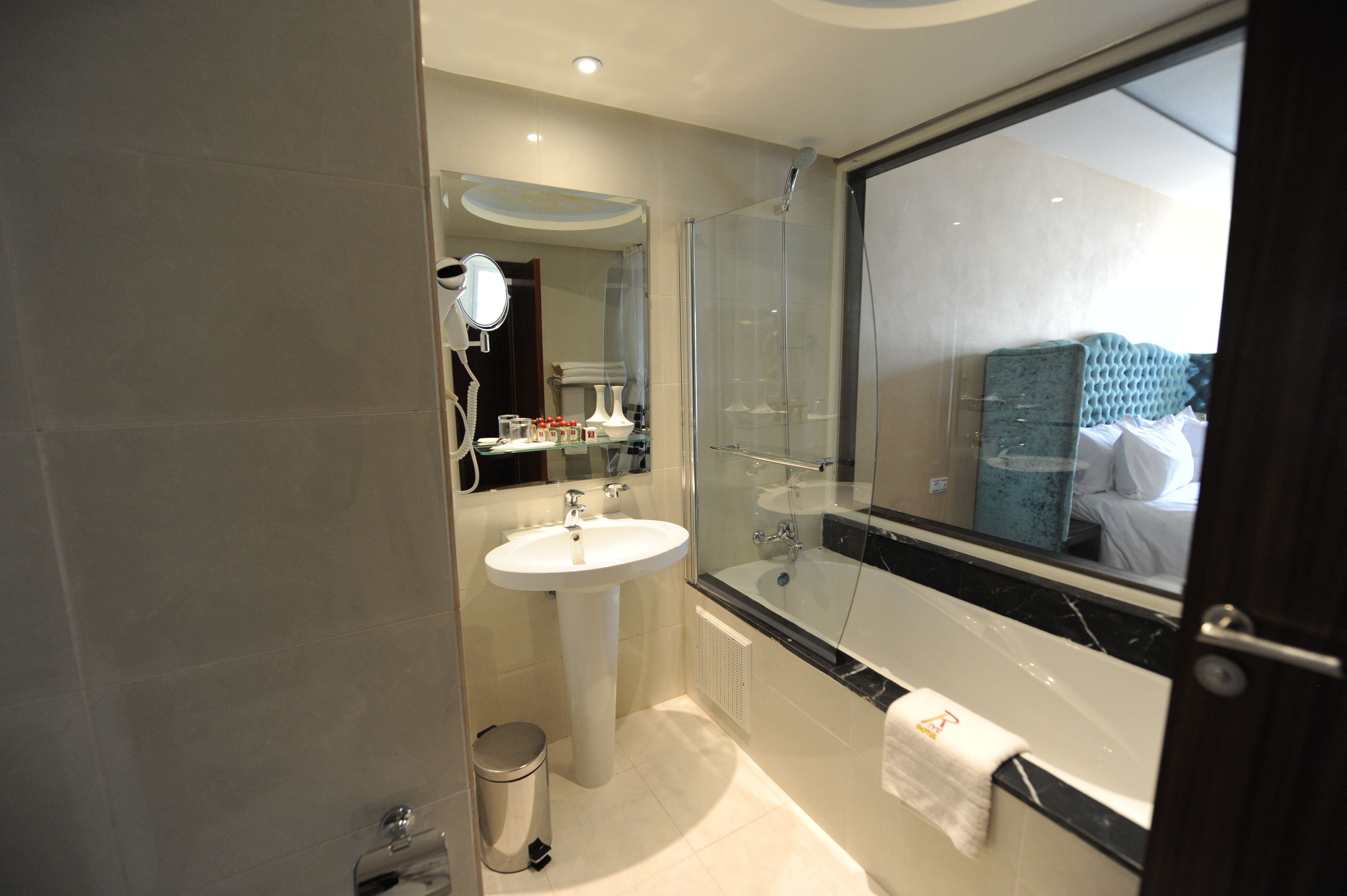 deep-soaking bathtub, rainfall showerhead, free toiletries, hair dryer