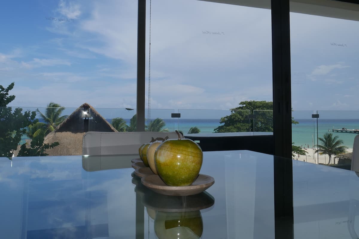 Junior Suite, 2 Bedrooms | Living room | 32-inch LED TV with digital channels, TV, iPod dock
