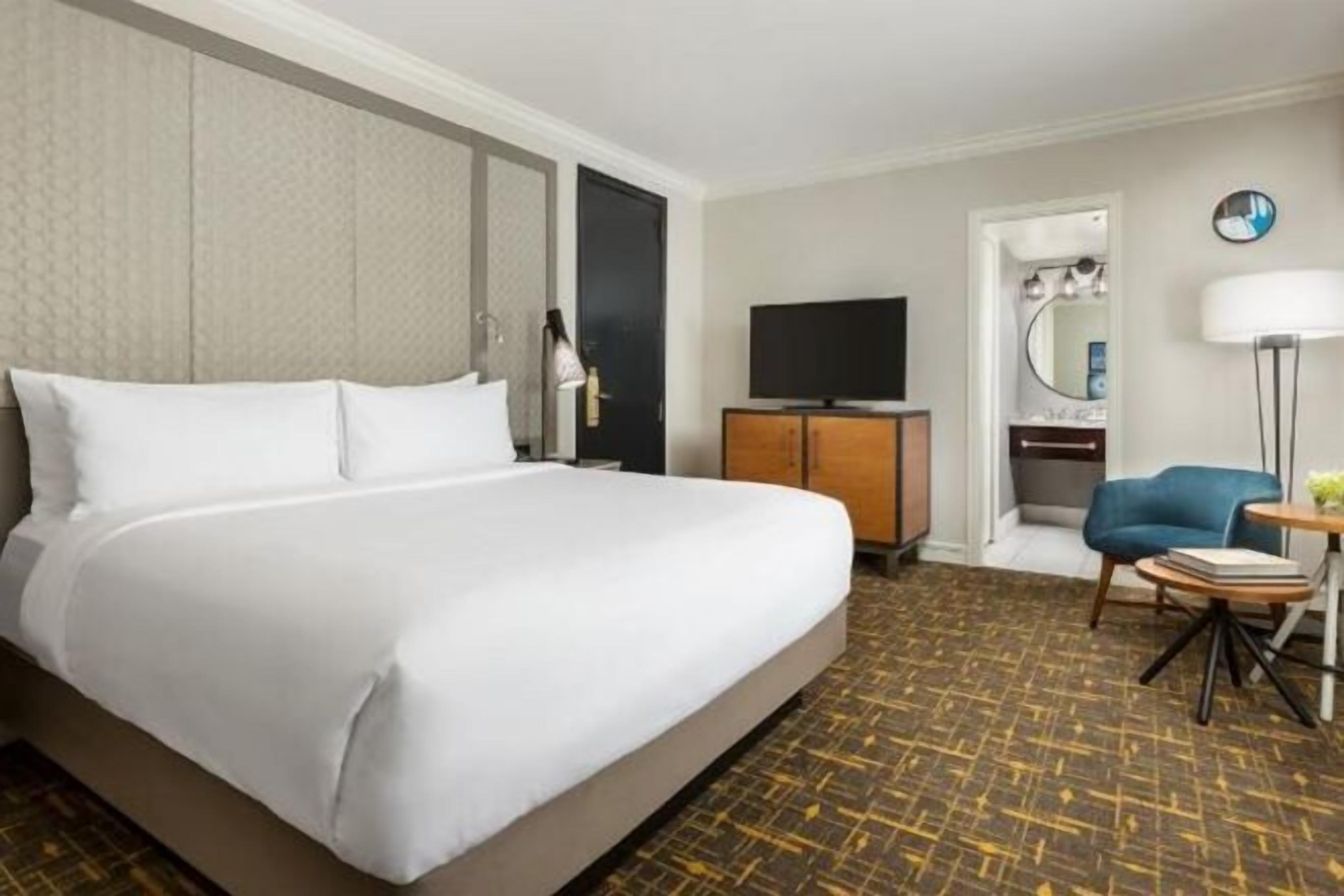 Hypo-allergenic bedding, down comforters, pillowtop beds, in-room safe