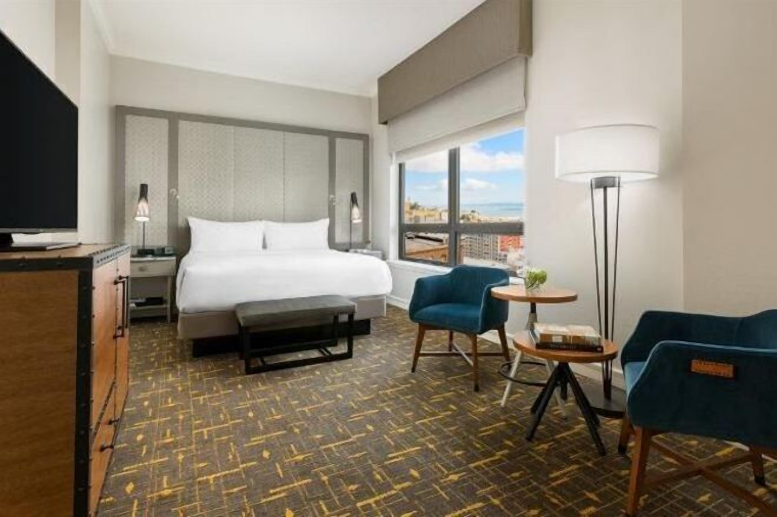 Hypo-allergenic bedding, down comforters, pillowtop beds, in-room safe