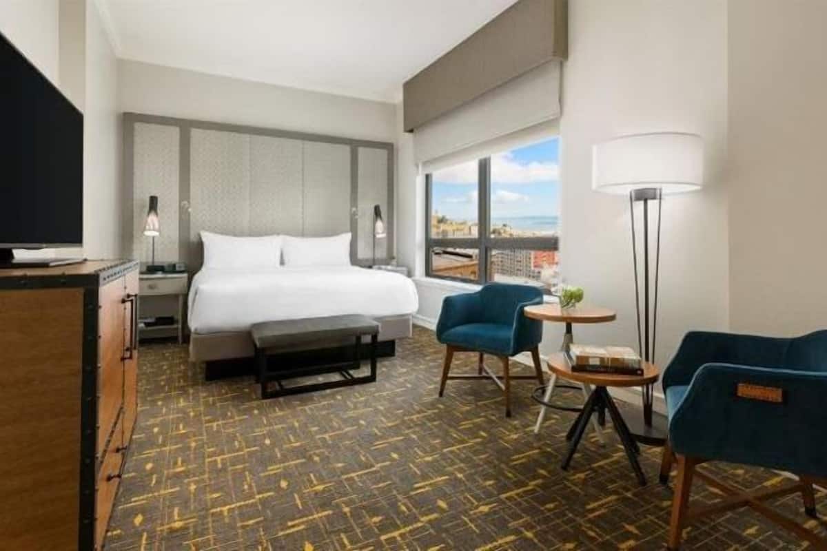 Hypo-allergenic bedding, down comforters, pillowtop beds, in-room safe