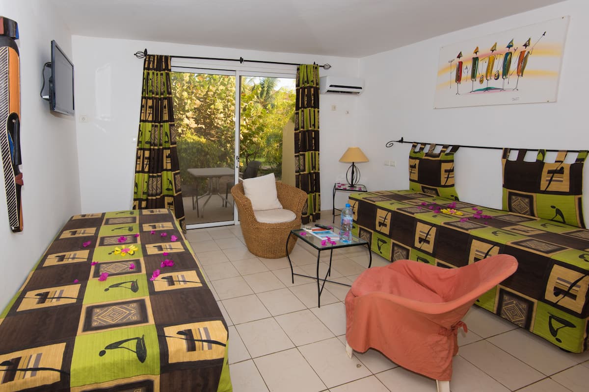 Desk, blackout curtains, free cots/infant beds, bed sheets