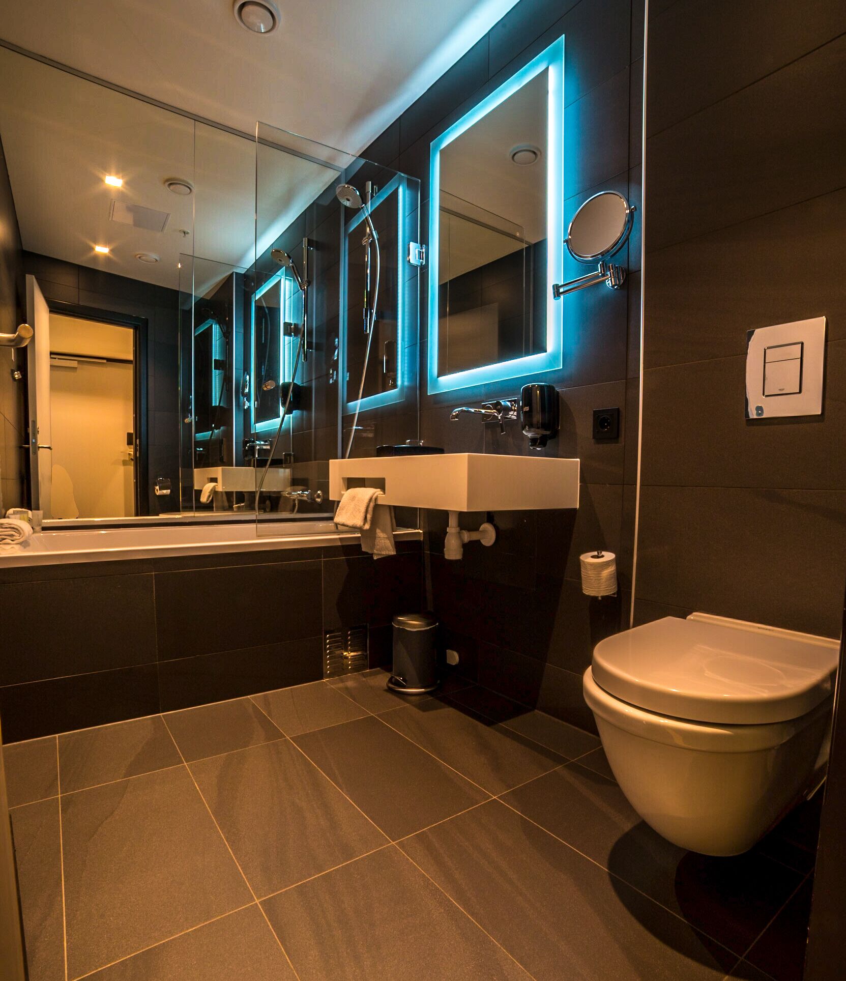 deluxe room, 1 king bed | bathroom | free toiletries, hair dryer, towels