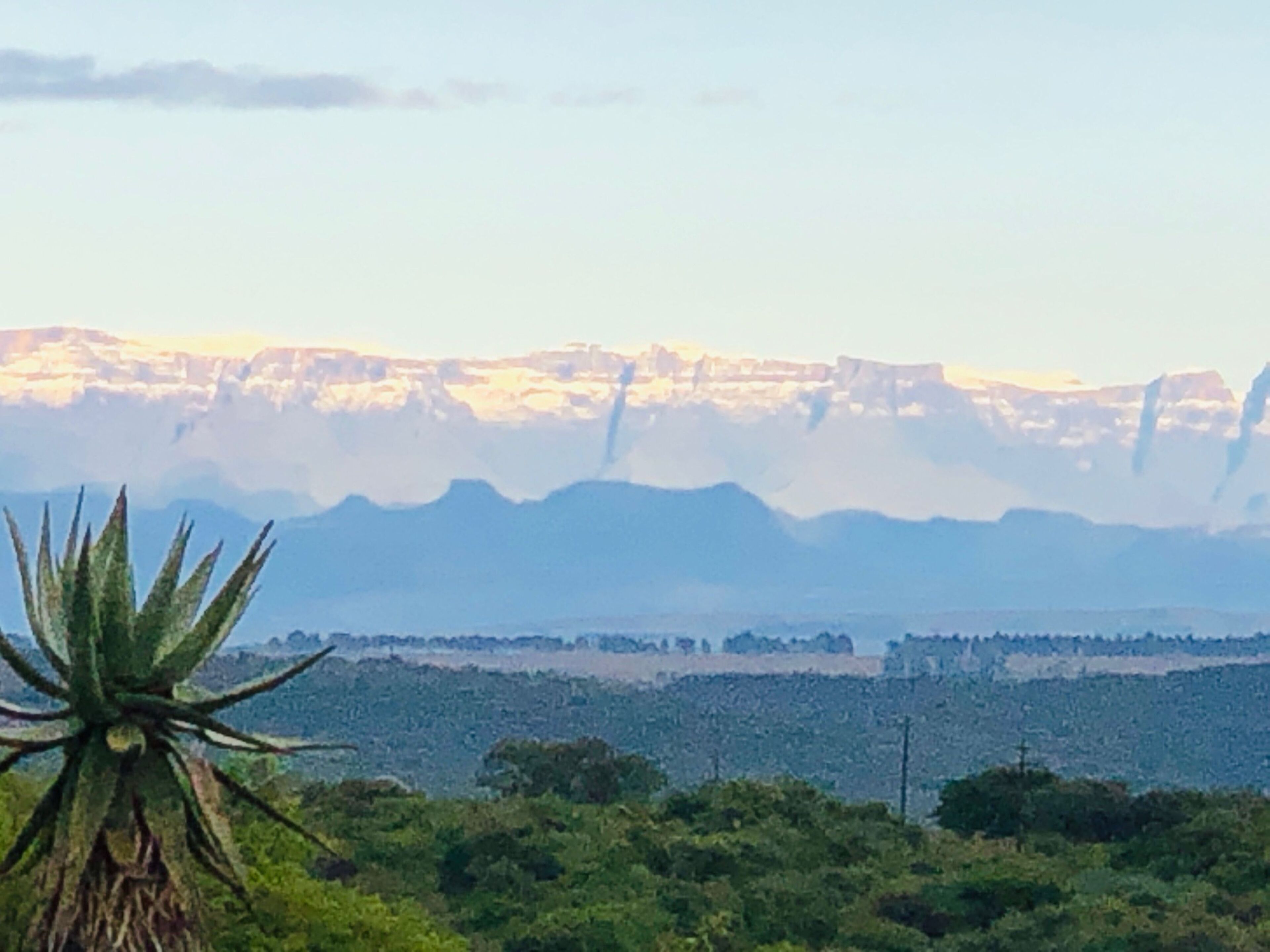 A mountain landscape with a clear sky.