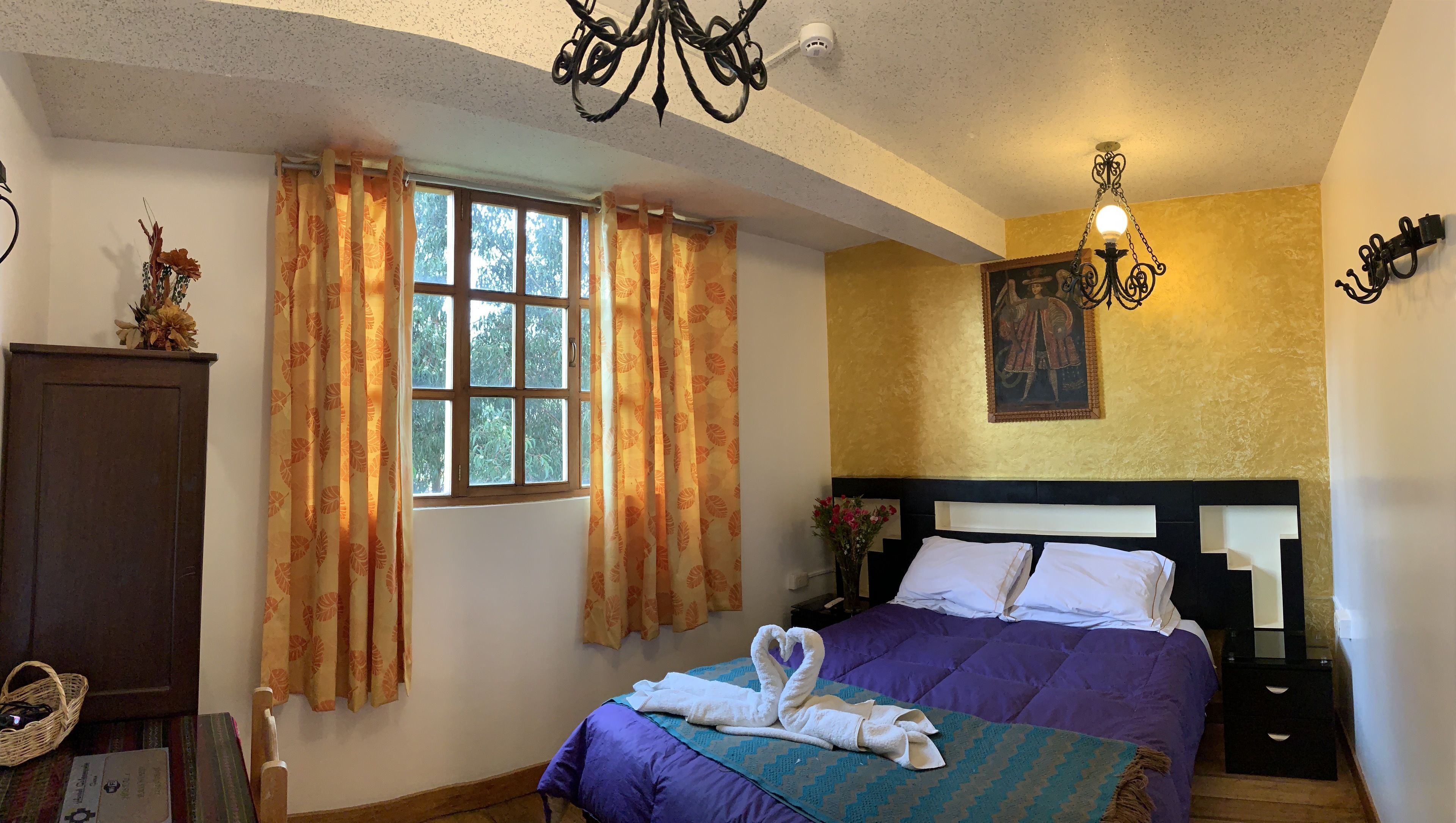 Down duvets, memory-foam beds, in-room safe, desk