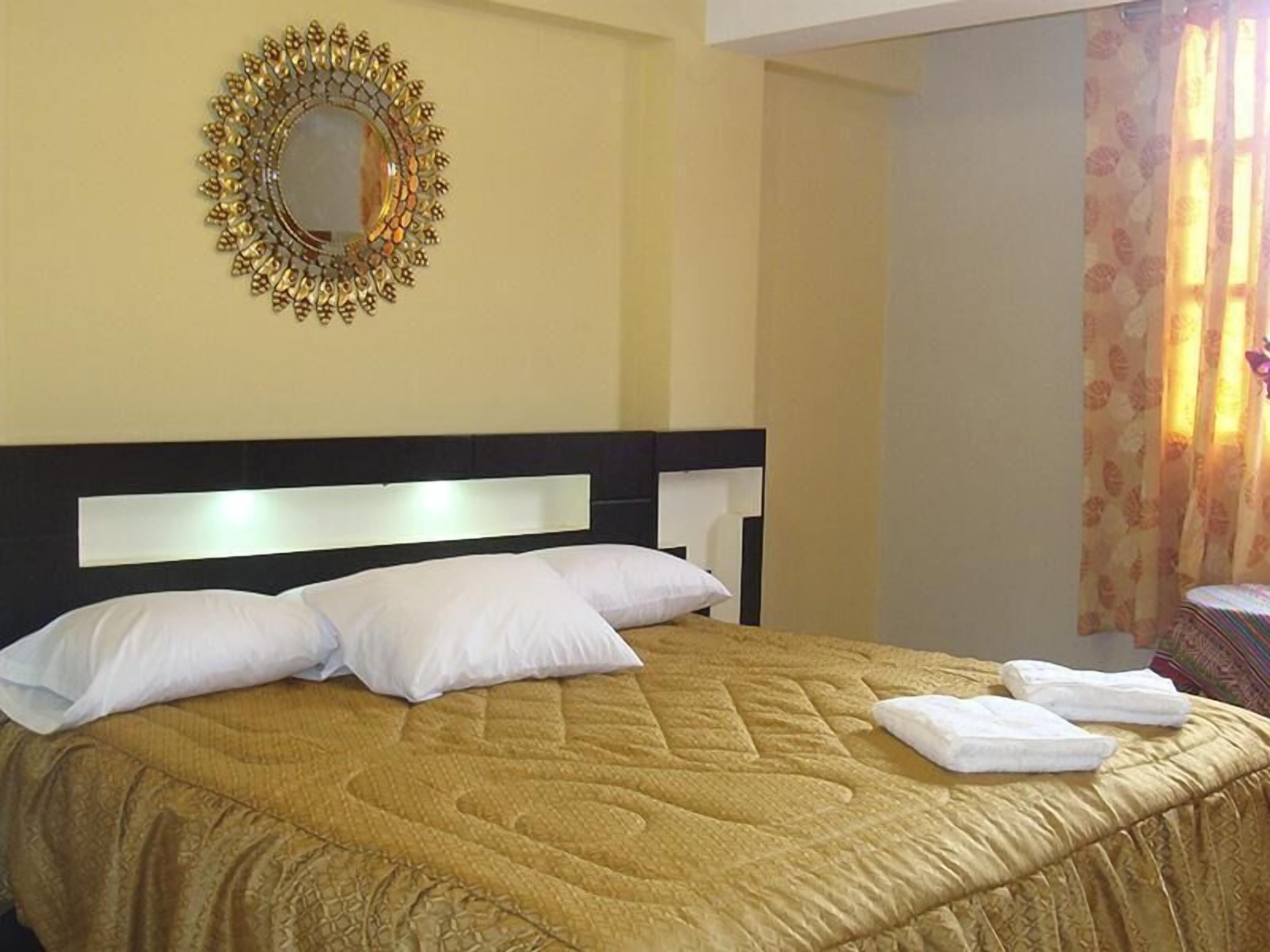 Down comforters, memory foam beds, in-room safe, desk
