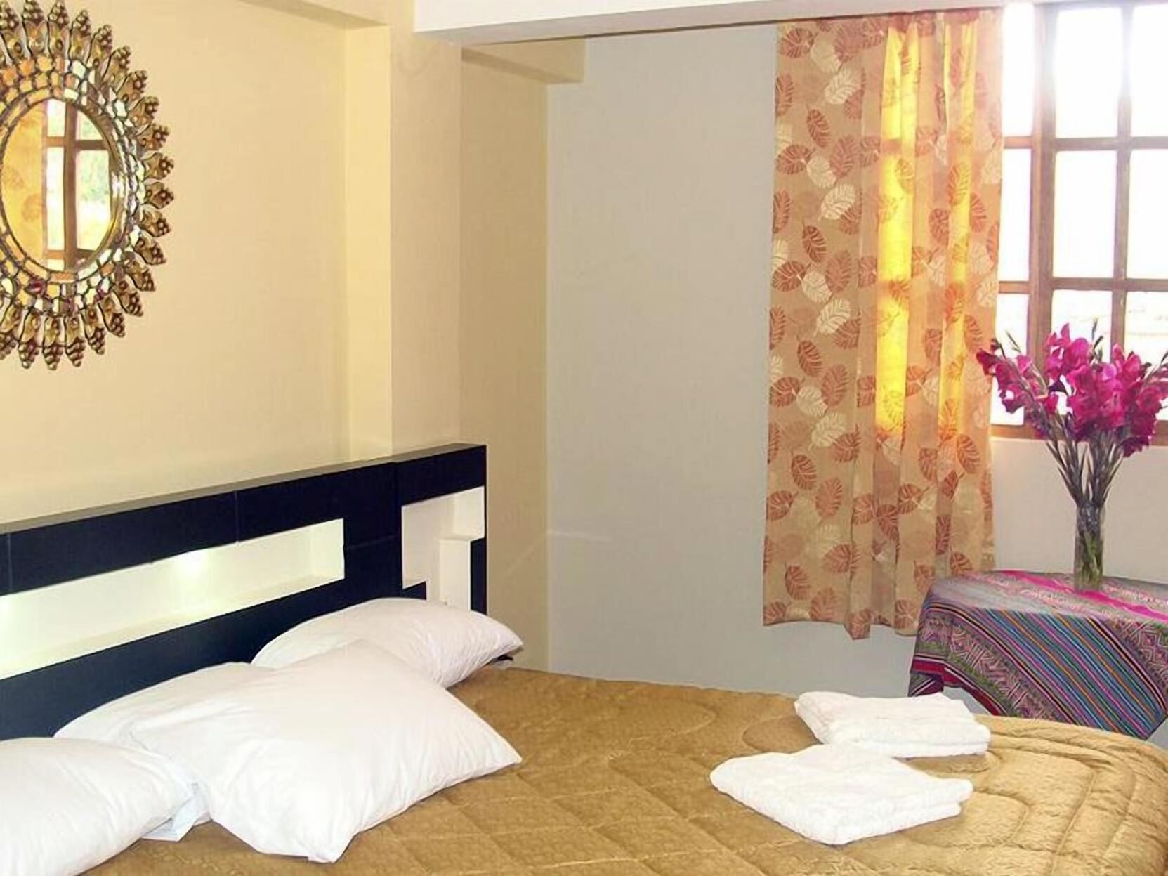 Down duvets, memory-foam beds, in-room safe, desk