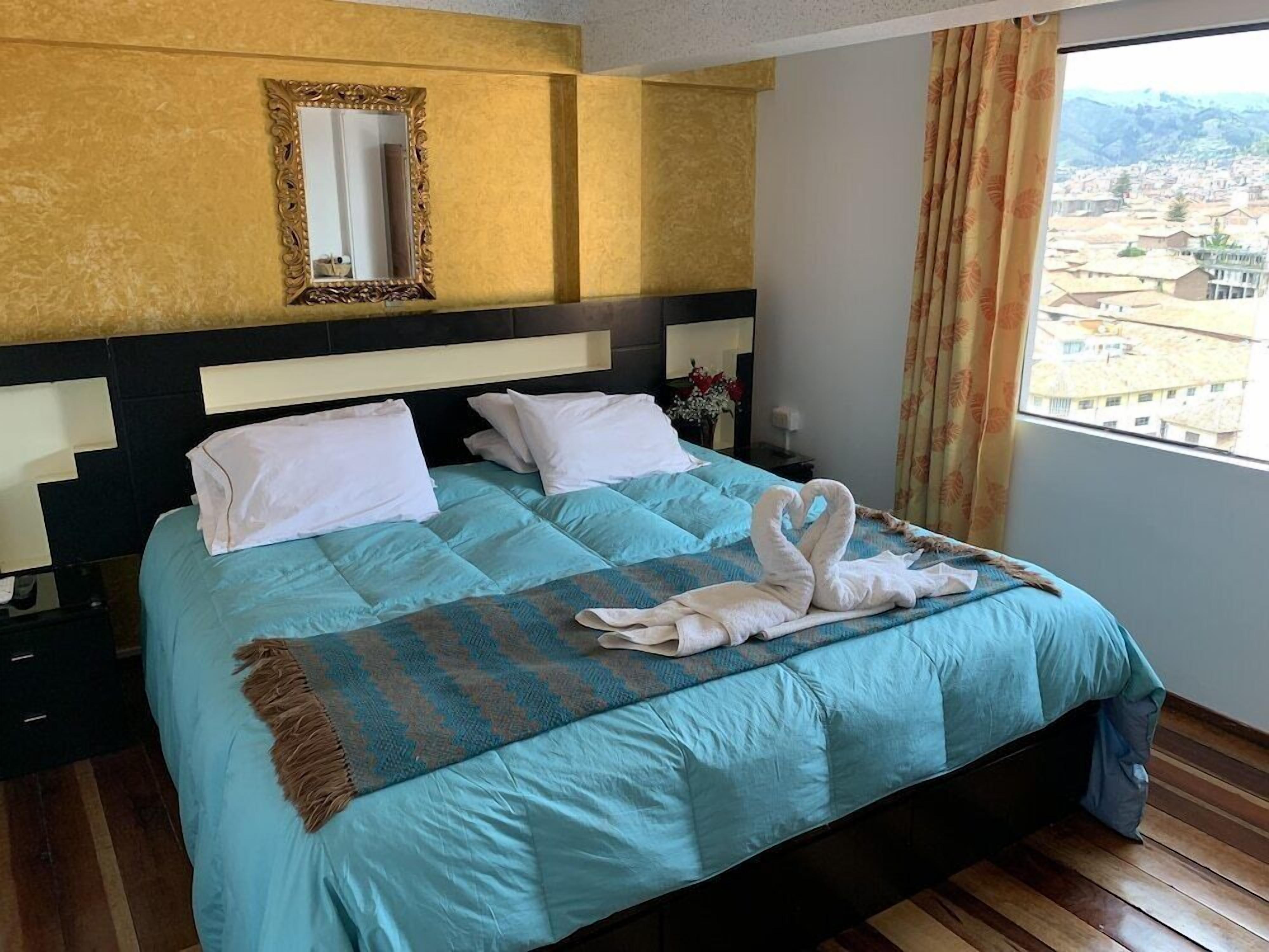 Down duvets, memory-foam beds, in-room safe, desk