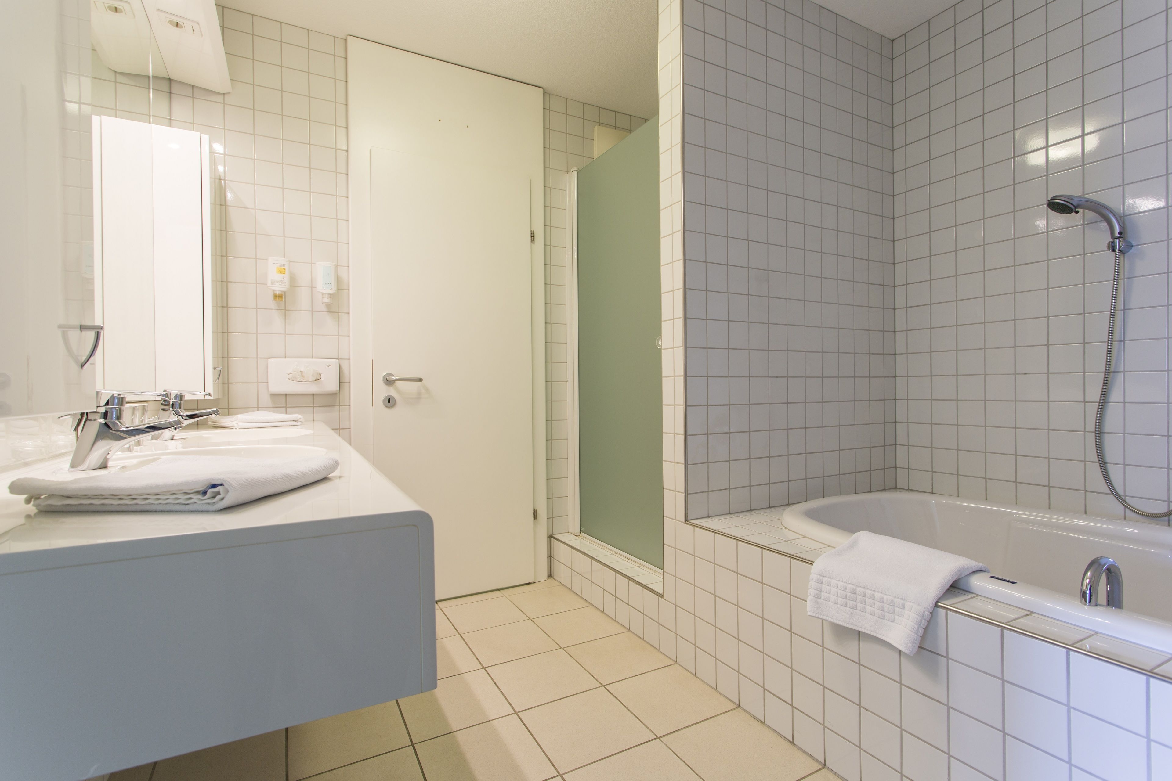 suite, 3 bedrooms, balcony, mountain view (lohmann ) | bathroom | deep-soaking bathtub, hair dryer, bathrobes, slippers