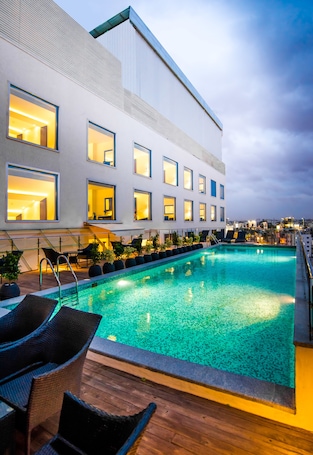 Outdoor pool. Howard Johnson by Wyndham Bengaluru Hebbal
