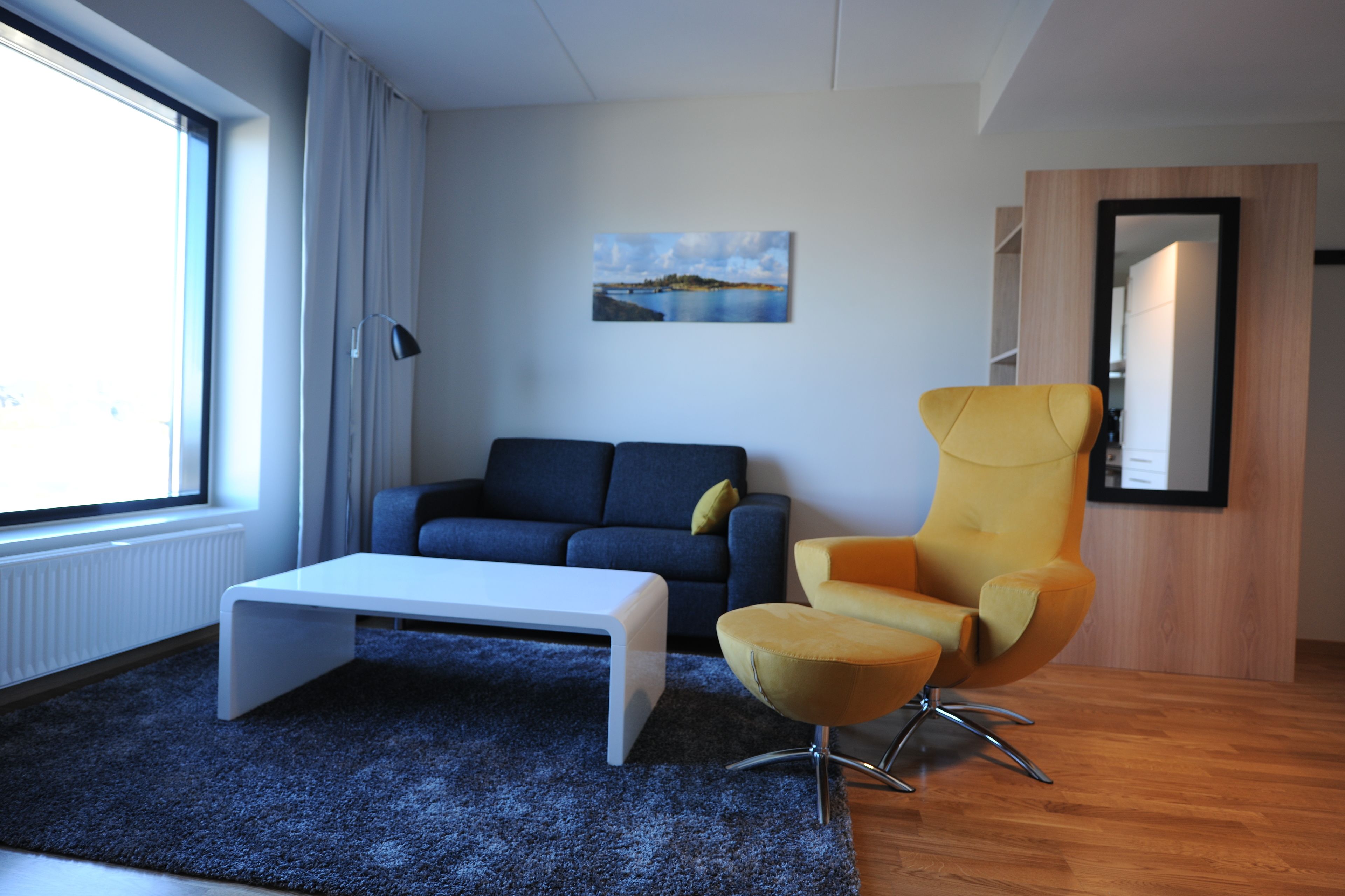 deluxe apartment, 1 bedroom | living area | flat-screen tv