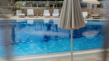 Indoor pool, seasonal outdoor pool, free pool cabanas, pool umbrellas