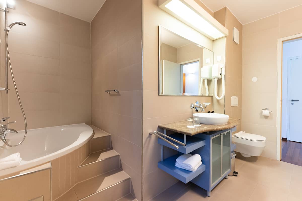 double or twin room | bathroom | free toiletries, hair dryer, slippers, towels