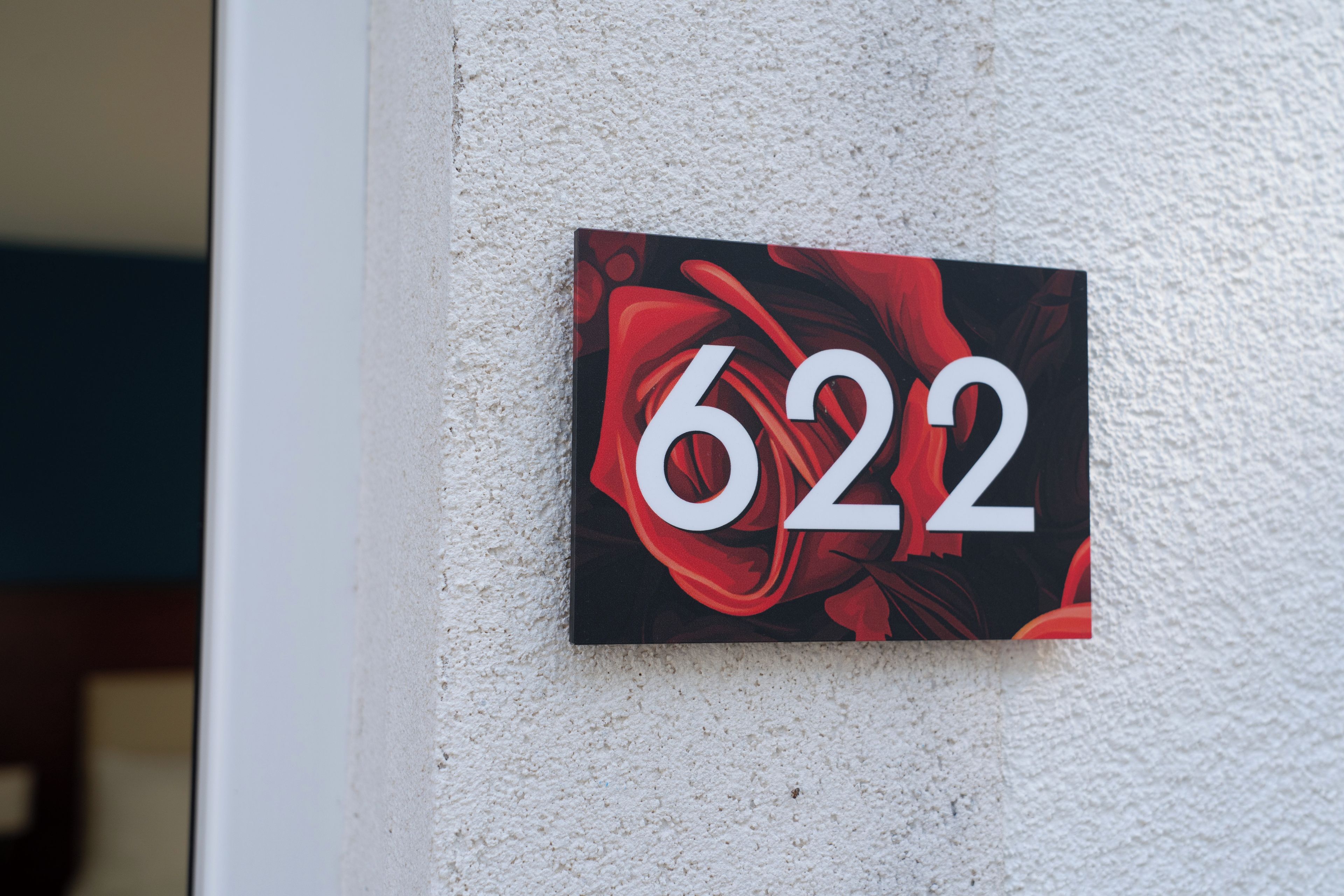 A wall-mounted sign with the number 622.