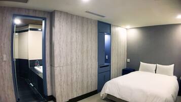 Standard Room, No Windows | Down duvets, minibar, individually decorated, individually furnished