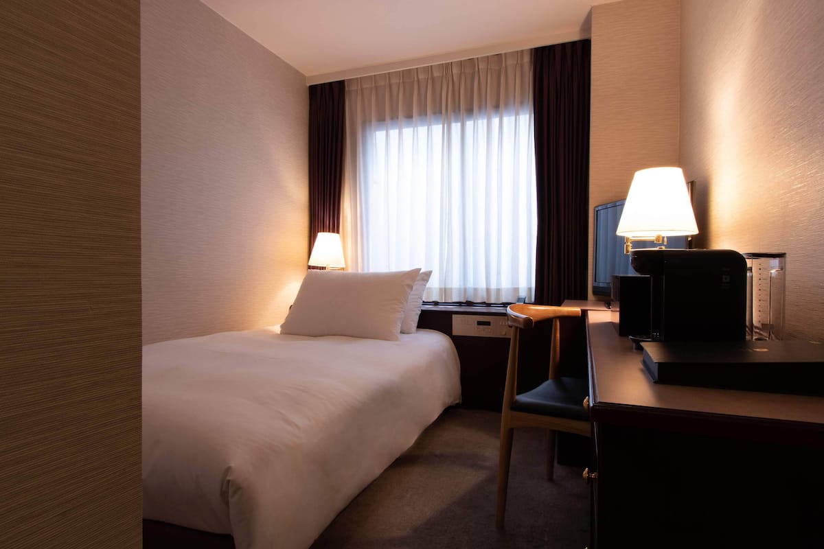 1 Schlafzimmer, Daunenbettdecken, Zimmersafe, Bügeleisen/Bügelbrett