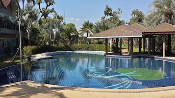 Outdoor pool, pool umbrellas, sun loungers
