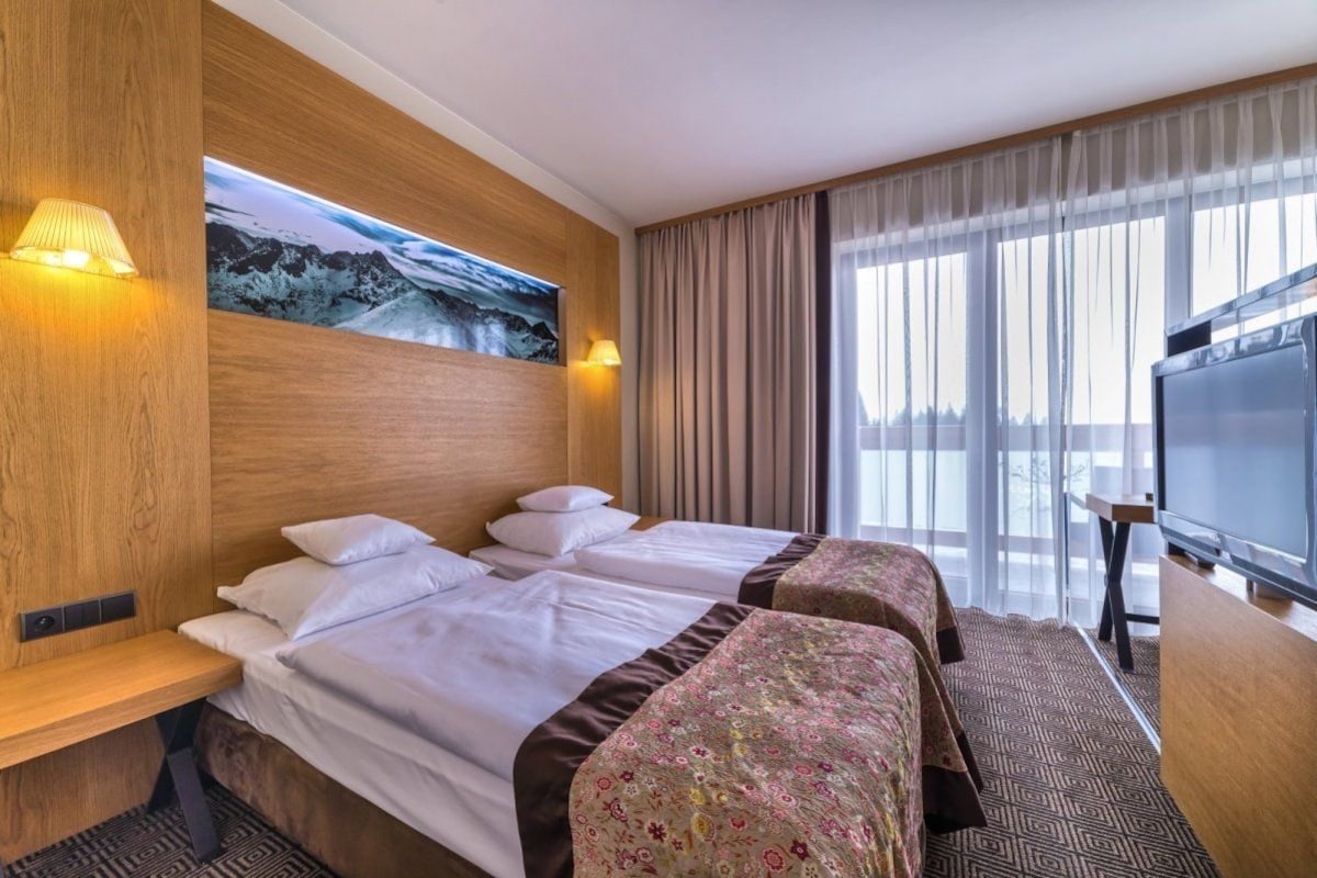 Sengetøy av topp kvalitet, minibar, safe på rommet og skrivebord