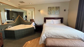 Deluxe Room, 1 Queen Bed, Jetted Tub | Desk, rollaway beds, free WiFi