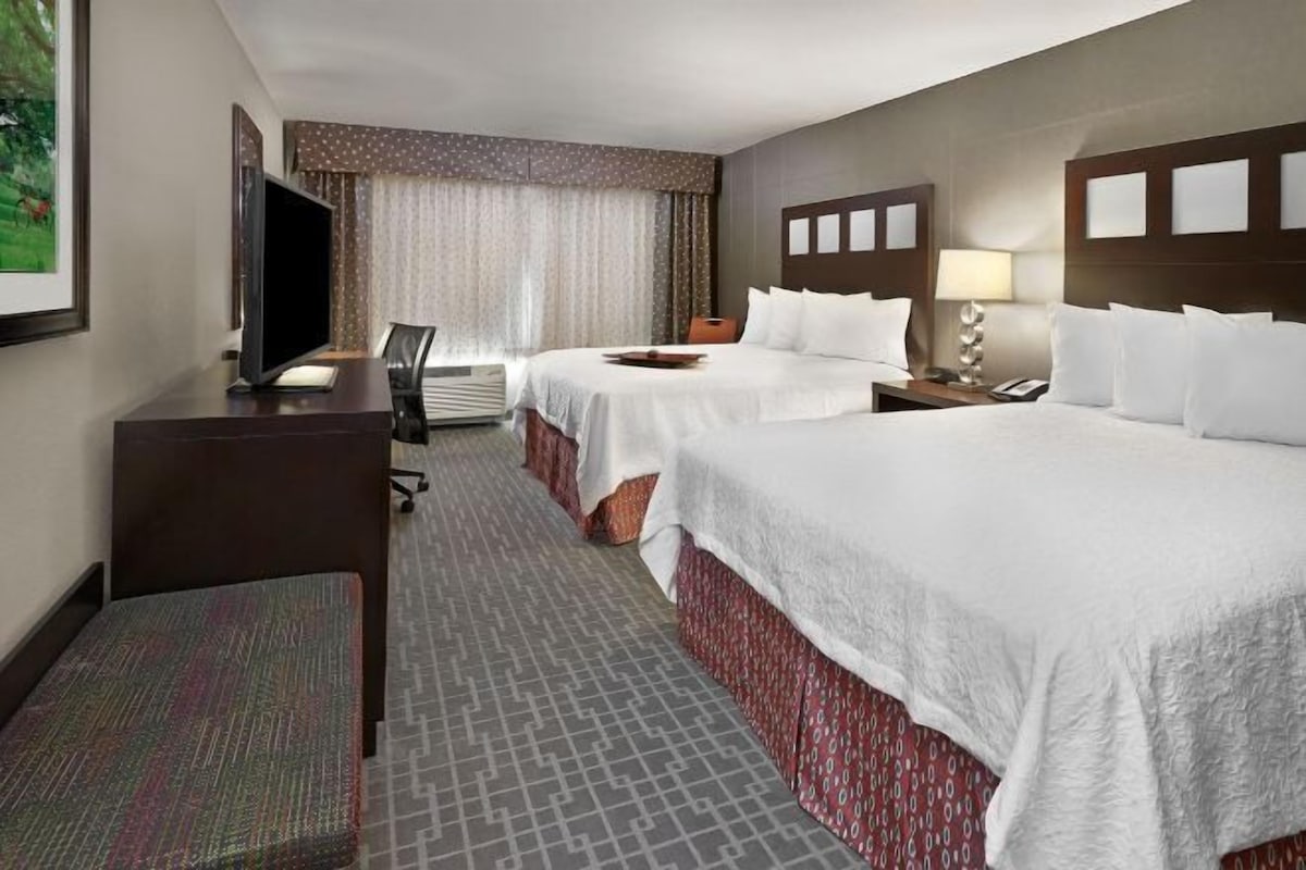 Hypo-allergenic bedding, pillow-top beds, in-room safe, desk