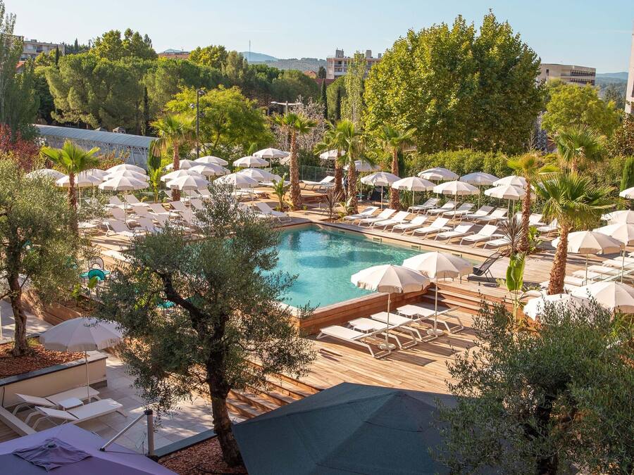 Indoor pool, seasonal outdoor pool, pool umbrellas, pool loungers
