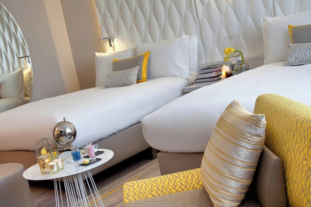 Family Room, 2 Double Beds | Hypo-allergenic bedding available, in-room safe, soundproofing