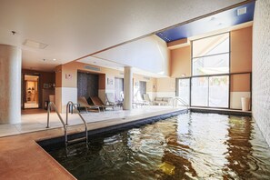 Indoor pool, seasonal outdoor pool, pool umbrellas, sun loungers