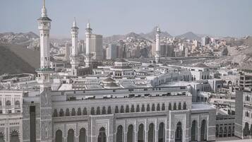 A large mosque complex with multiple minarets and a central courtyard.