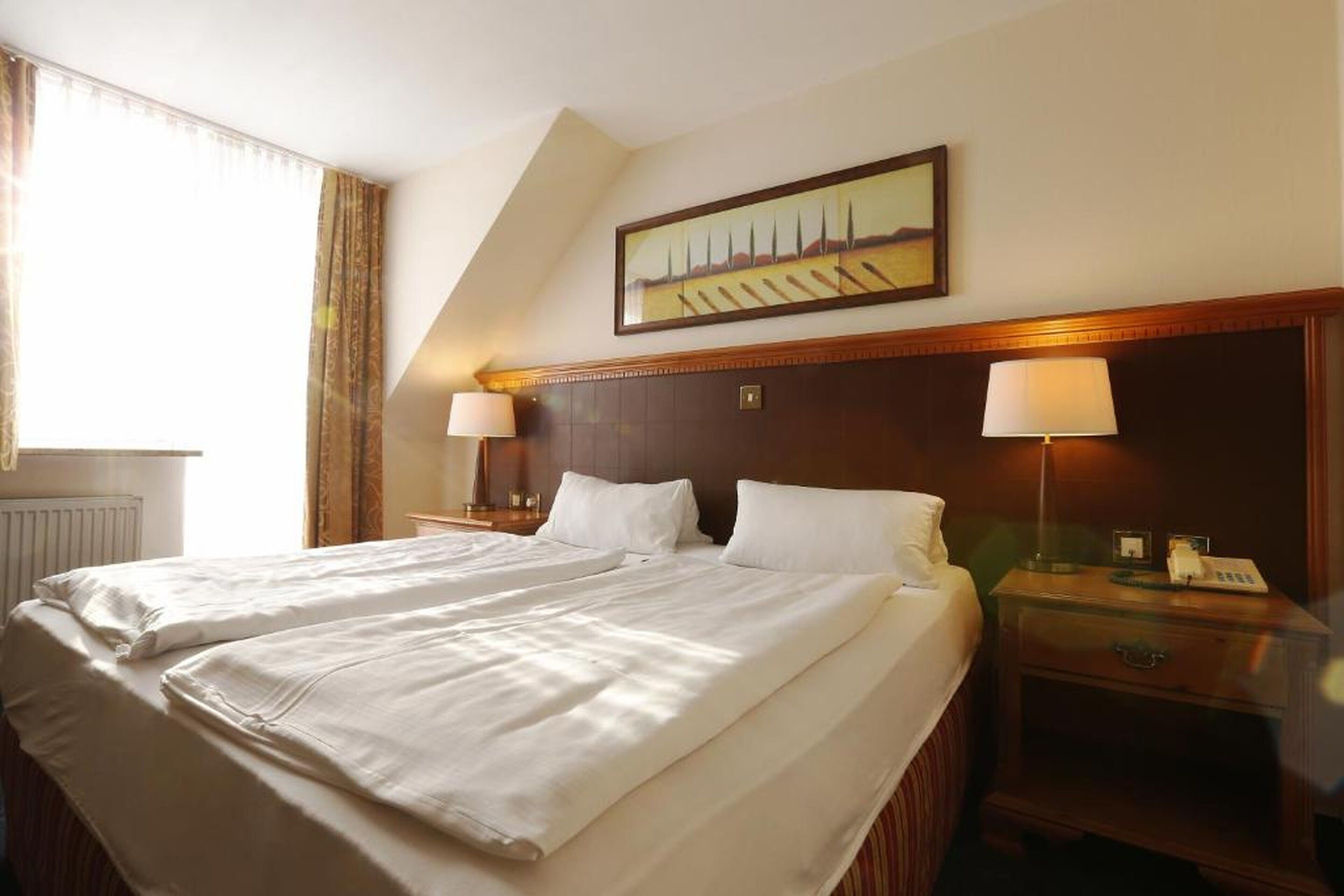 double room | in-room safe, individually decorated, desk, blackout curtains