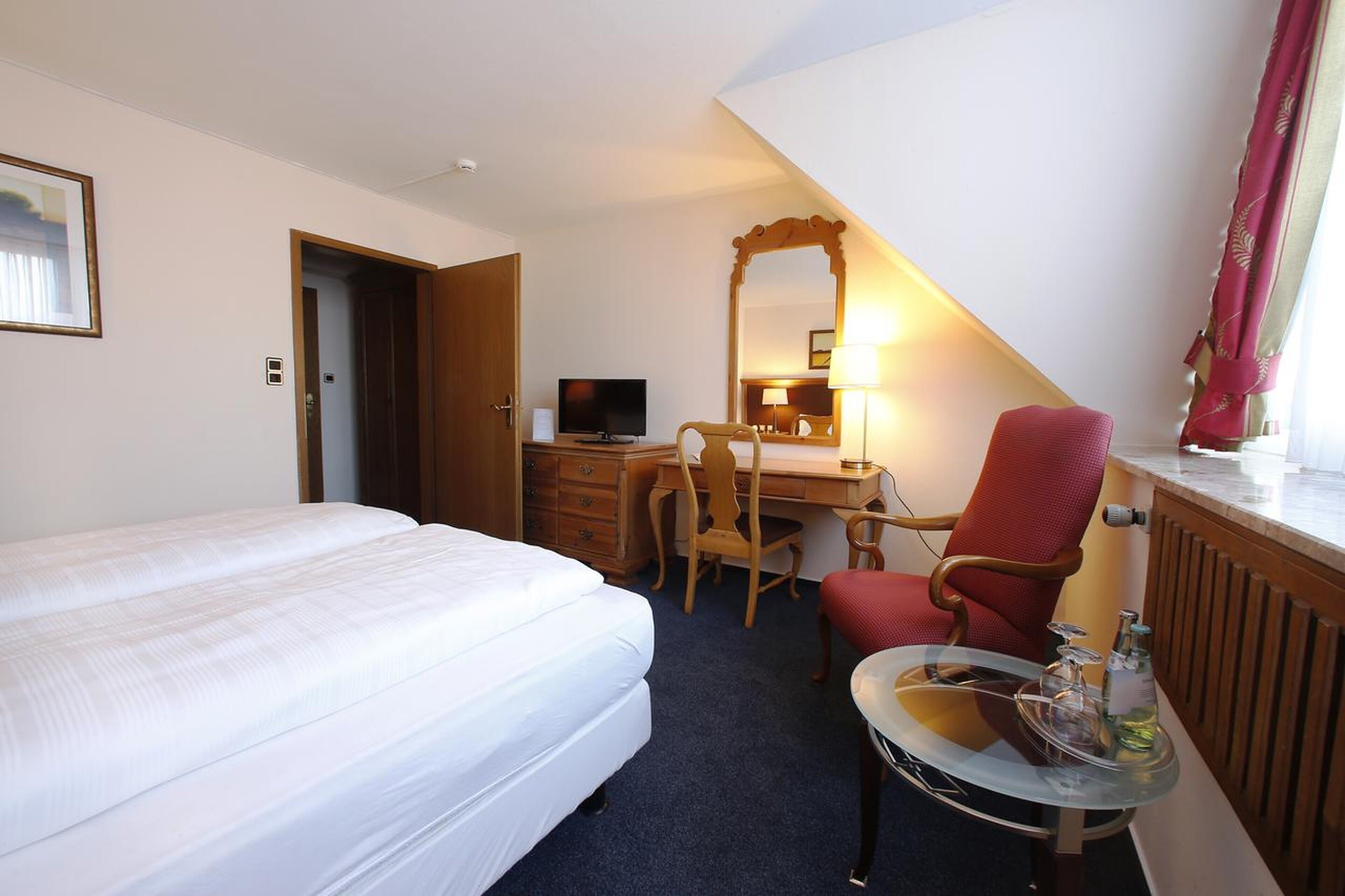 double room | in-room safe, individually decorated, desk, blackout curtains