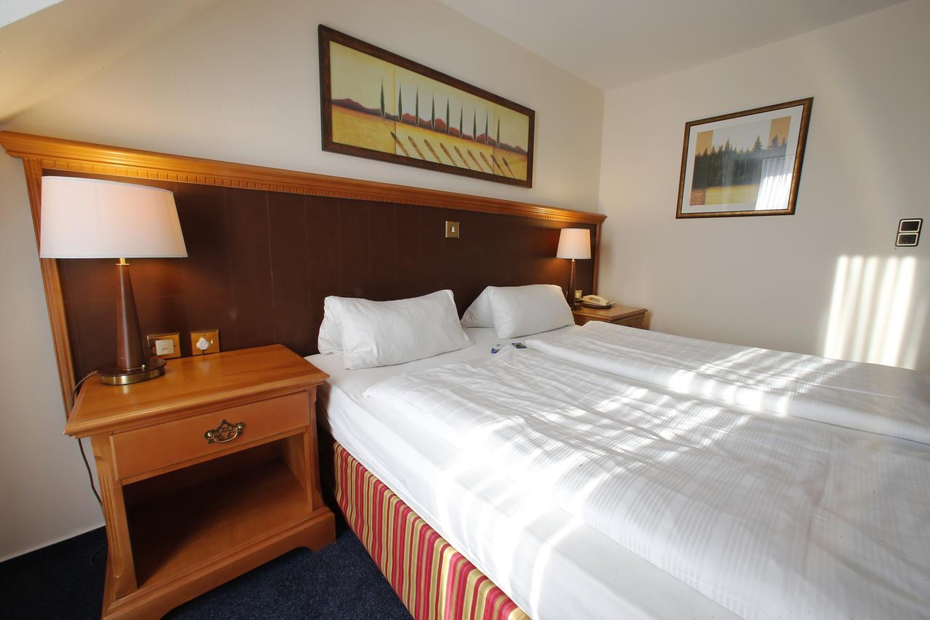 double room | in-room safe, individually decorated, desk, blackout curtains