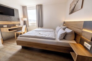 Double Room | In-room safe, individually decorated, desk, blackout drapes