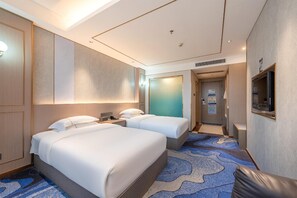 Premium bedding, down comforters, pillowtop beds, free minibar items - Calvin Hotel (Guangzhou)