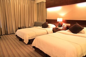 Premium bedding, down comforters, pillowtop beds, free minibar items - Calvin Hotel (Guangzhou)