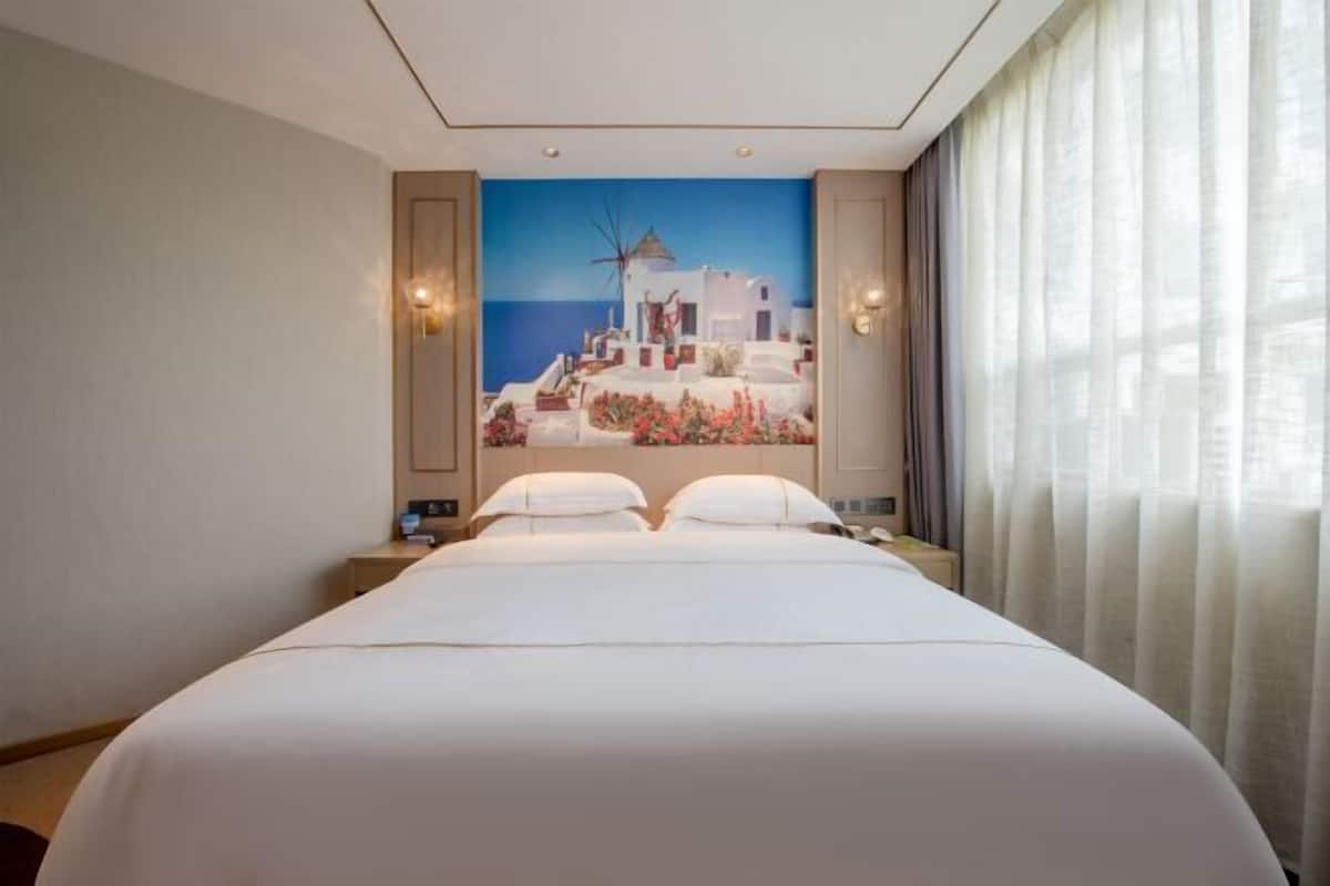 Premium bedding, down duvets, pillow-top beds, free minibar items