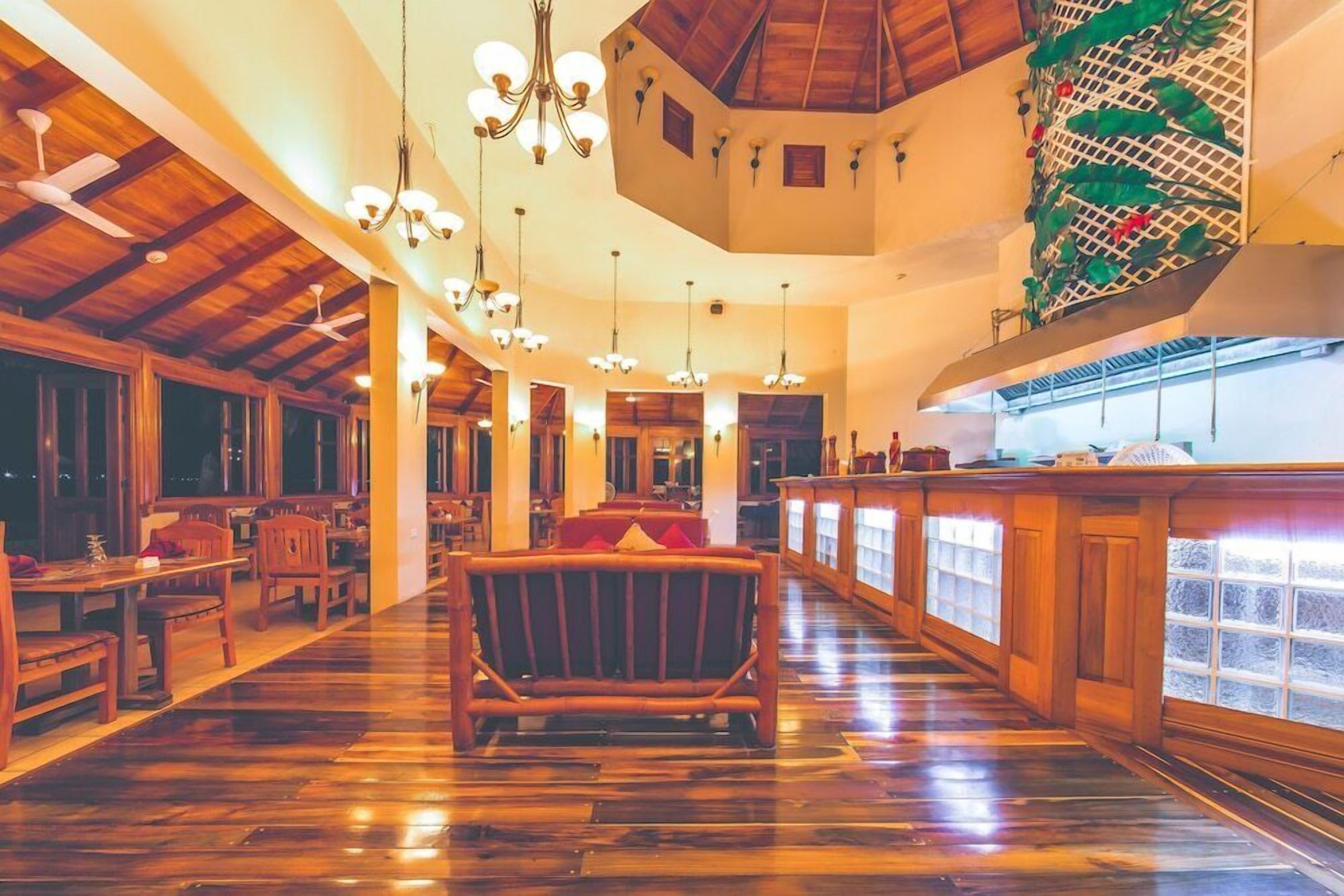 Breakfast, lunch, dinner served; international cuisine, beach views 