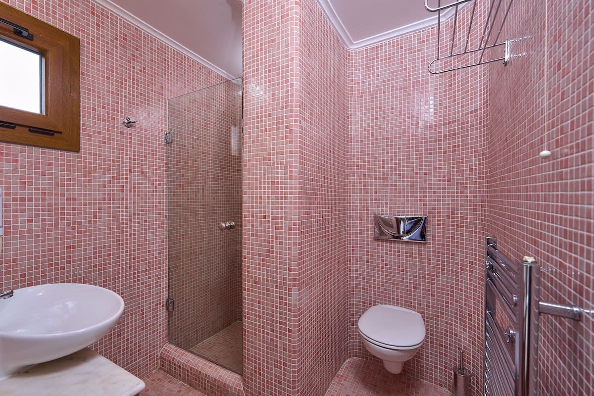 double room | bathroom | designer toiletries, hair dryer, slippers, towels