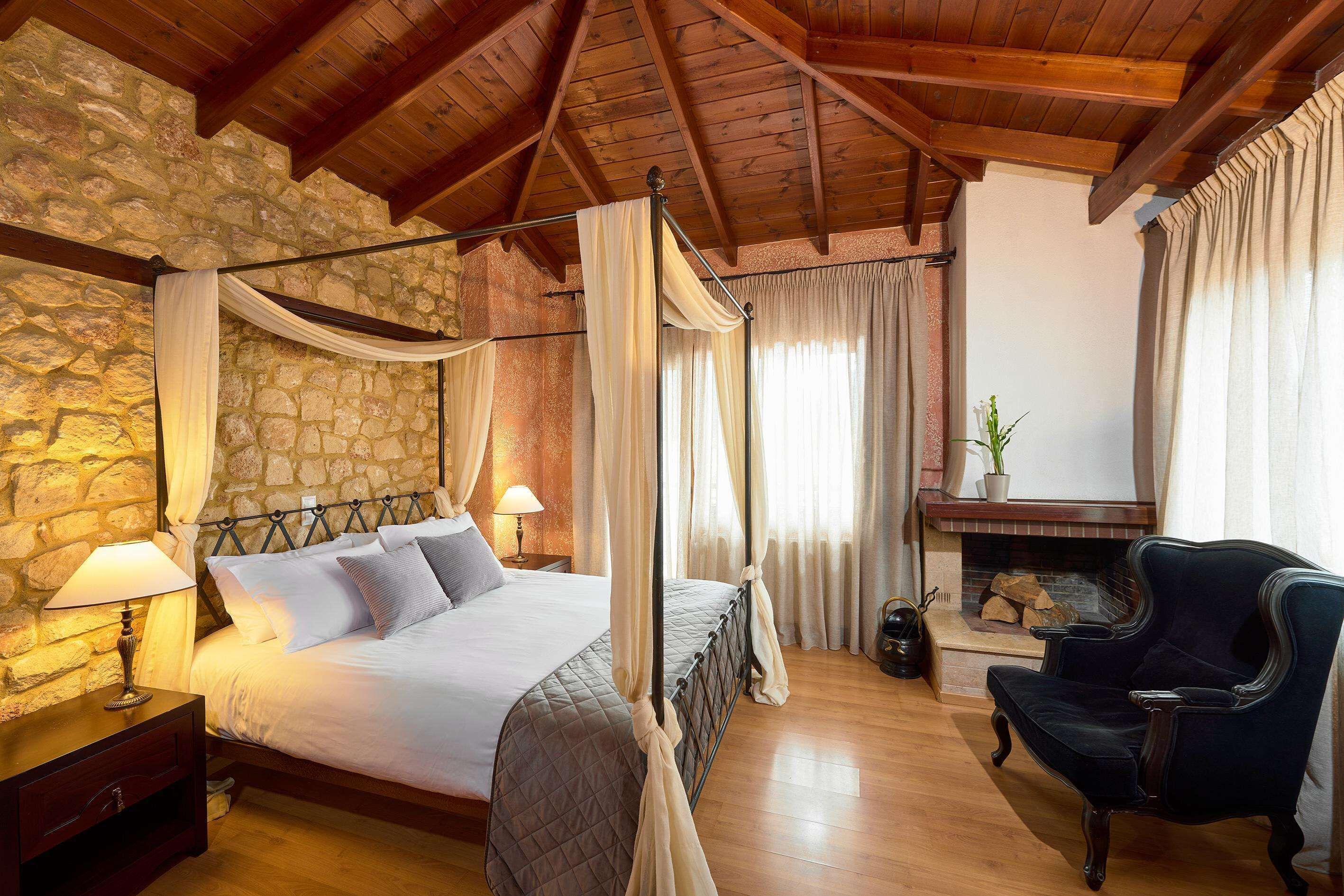 superior double room, fireplace | minibar, in-room safe, desk, free cots/infant beds