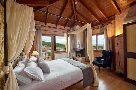 Superior Double Room, Fireplace | Minibar, in-room safe, desk, free cribs/infant beds. Olympus Mediterranean