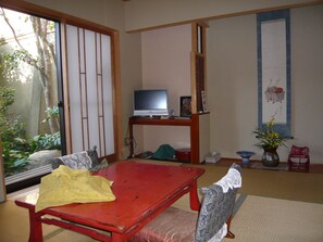 Twin Room with Garden View - Ground Floor | Living area | Flat-screen TV, computer - Tsubakiso (Nara)