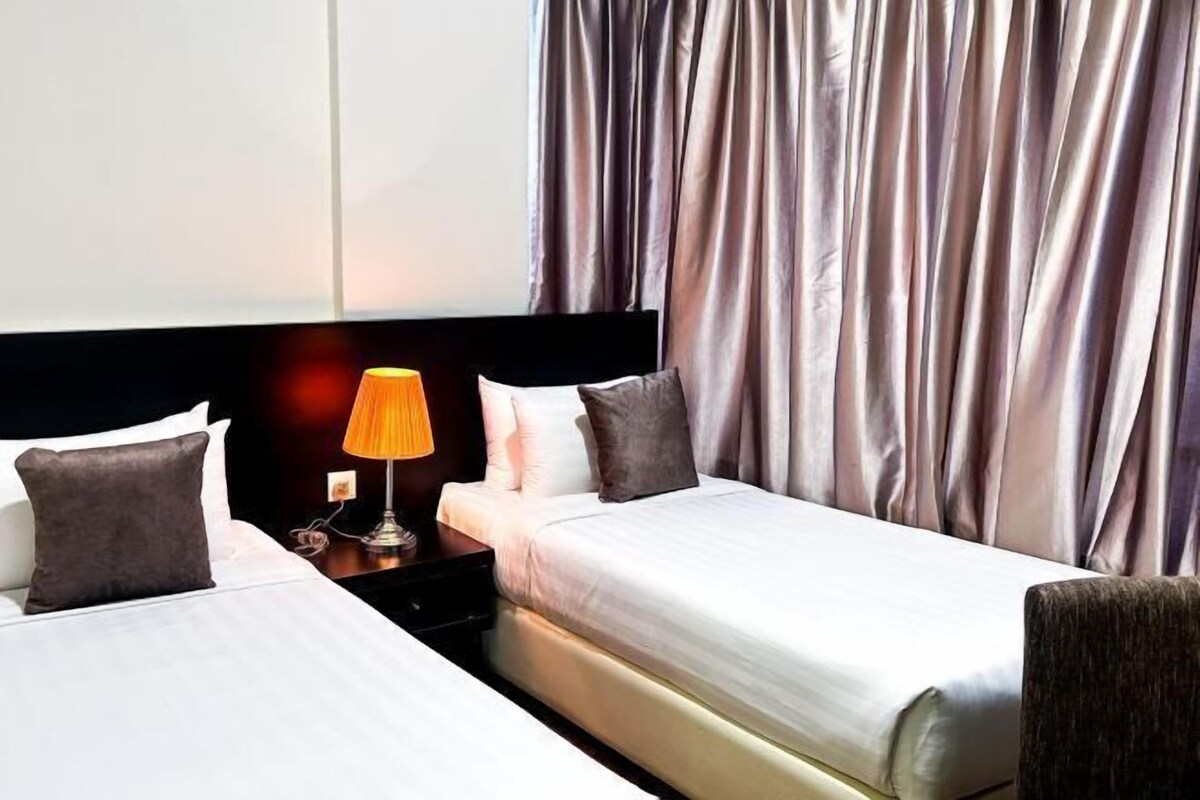Luxe beddengoed, een minibar, een kluis op de kamer, een bureau