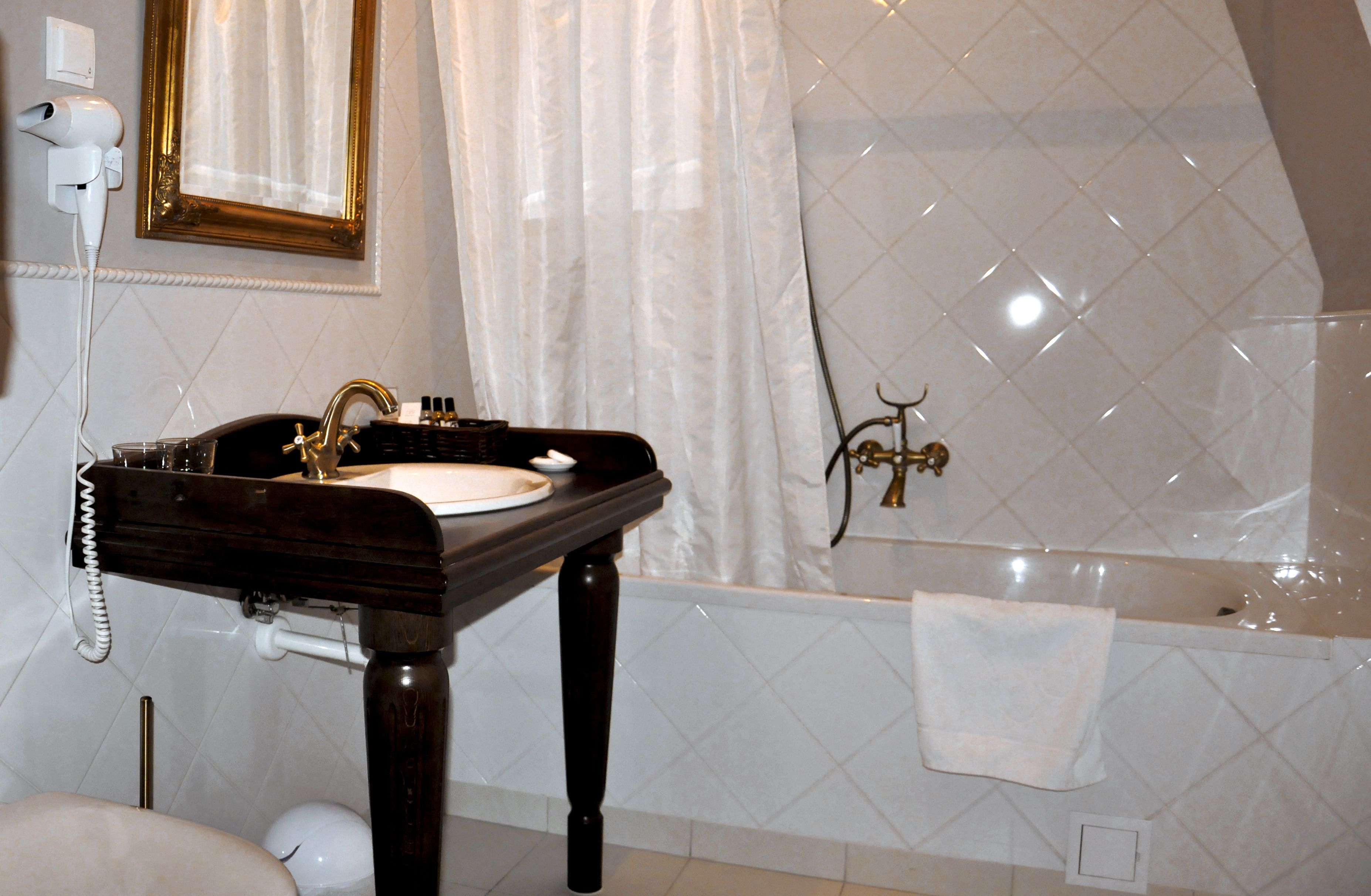 shower, designer toiletries, towels