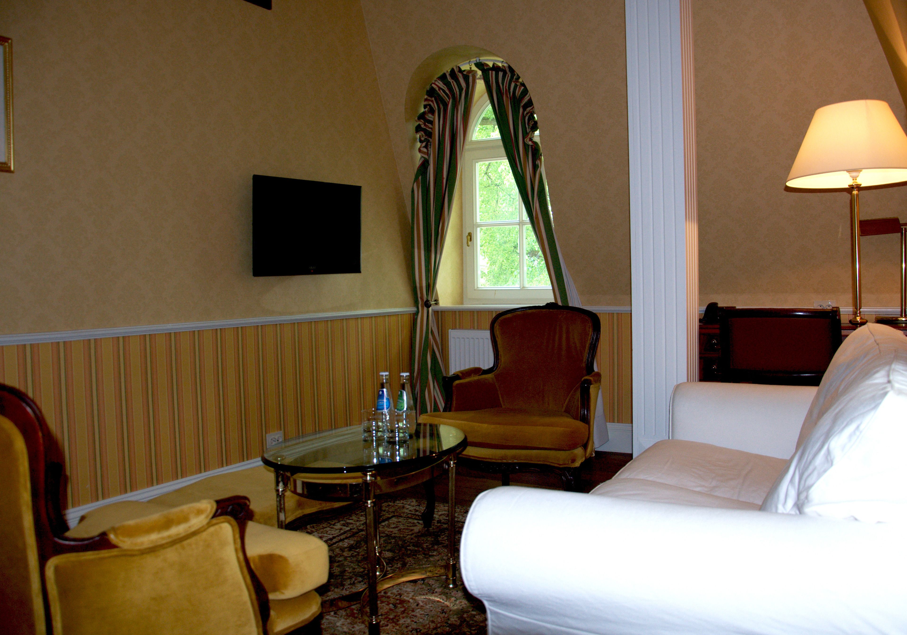 superior double or twin room | living room | plasma tv