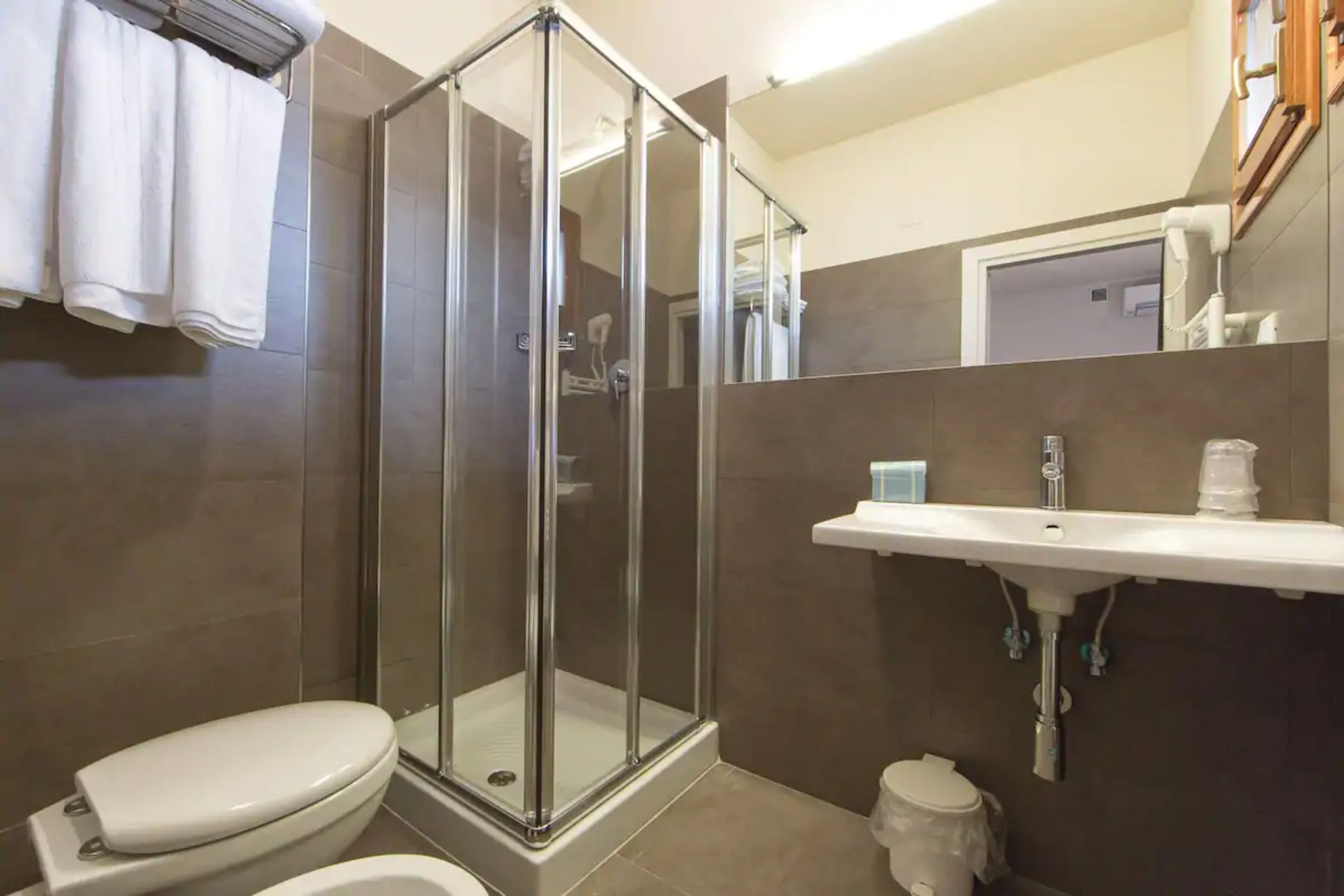 family room | bathroom | shower, free toiletries, hair dryer, slippers