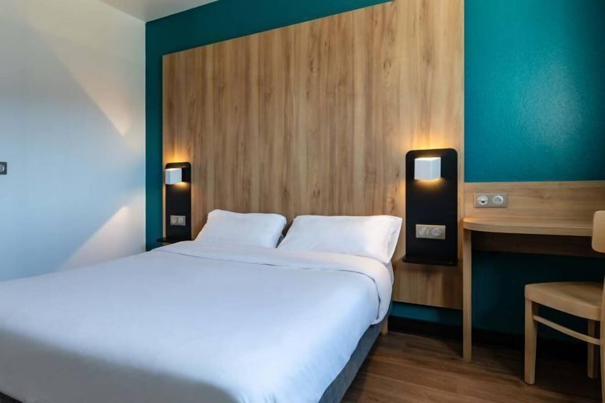 Ropa de cama de alta calidad, escritorio, insonorización y wifi gratis
