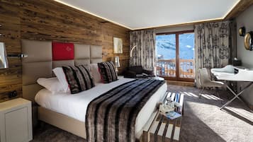 Luxe beddengoed, een minibar, een kluis op de kamer, een bureau