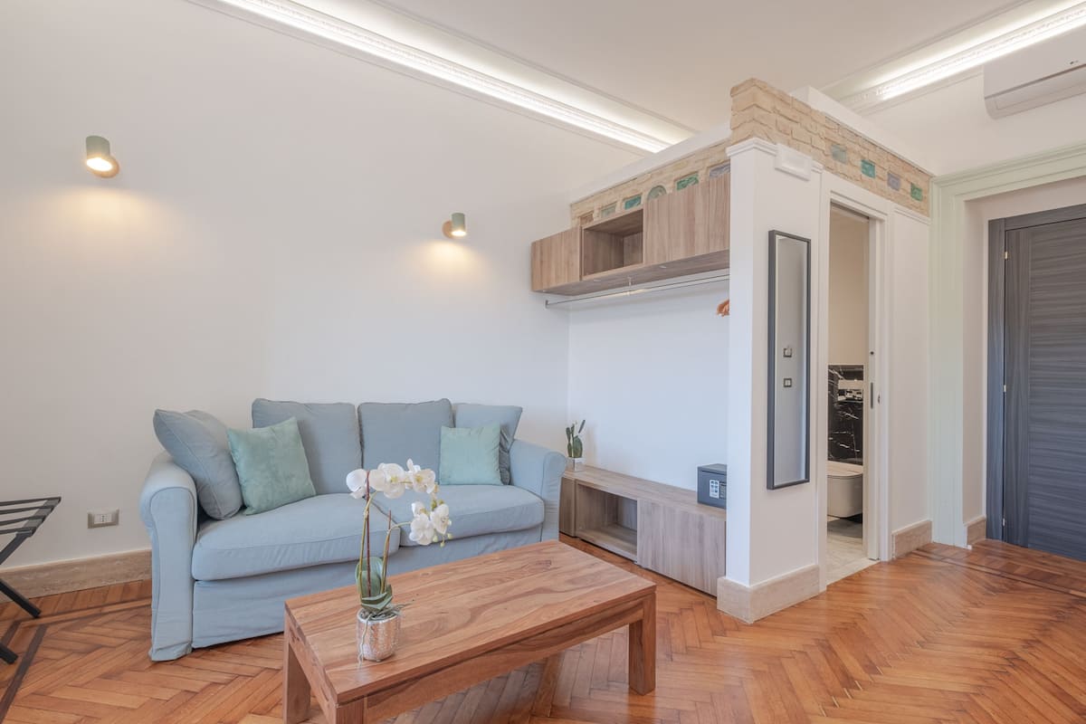 Suite | Living area | 32-inch LCD TV with satellite channels, TV, first-run films