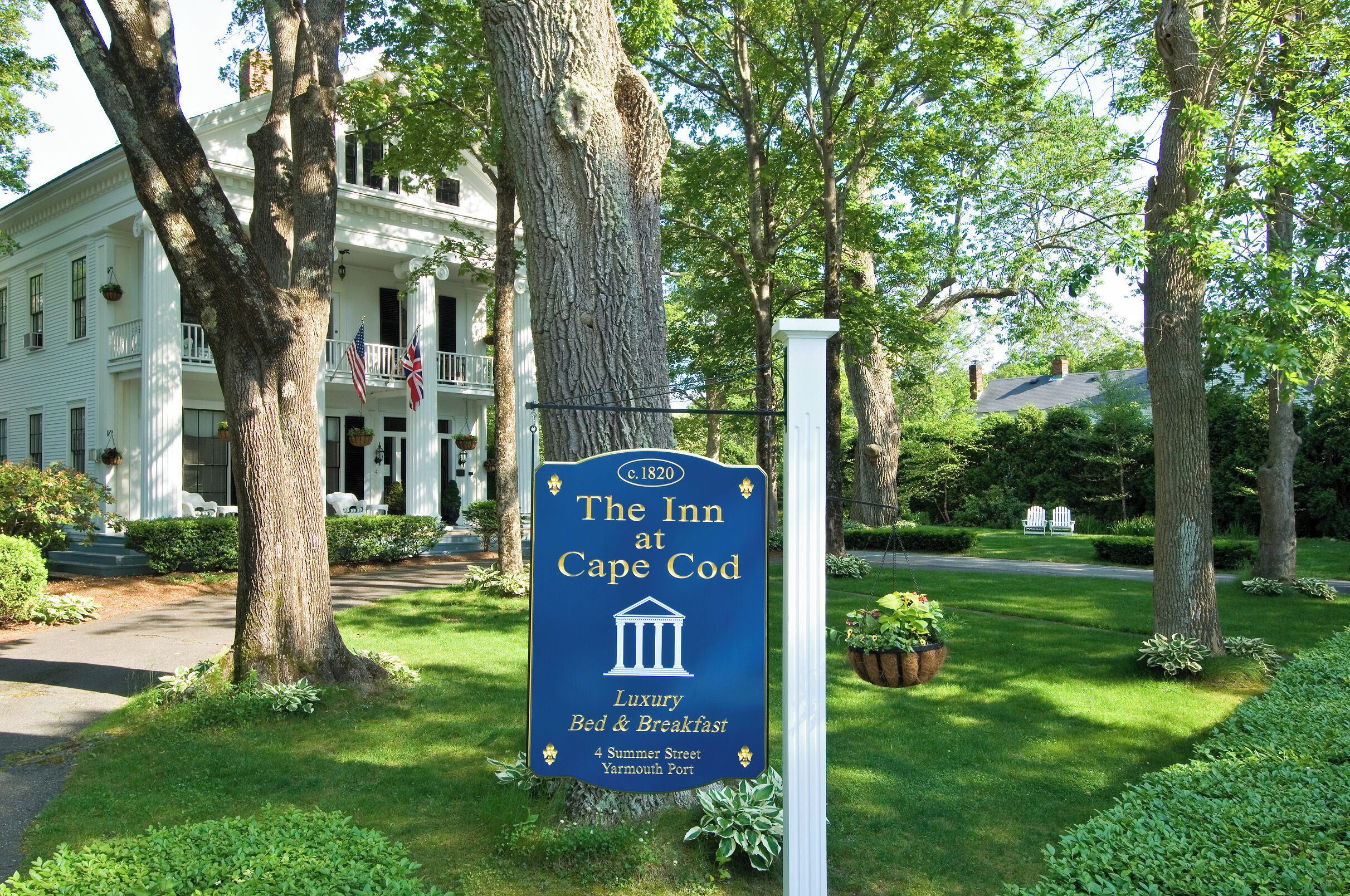 A sign for The Inn at Cape Cod, indicating it offers luxury bed and breakfast services.